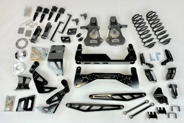 Black truck lift kit parts with springs.