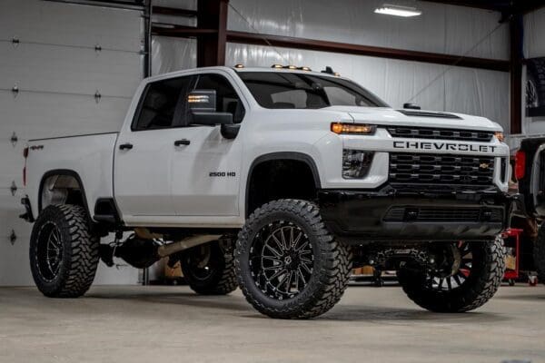 White Chevrolet 2500 HD pickup truck.