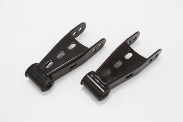 Two black metal suspension brackets.