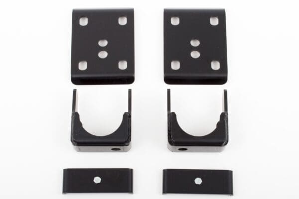 Black metal brackets and plates for car suspension.