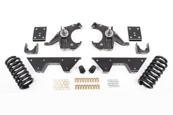 Car suspension lift kit with springs and hardware.