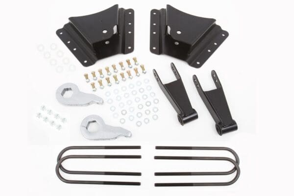 Truck lift kit with hardware and shackles.