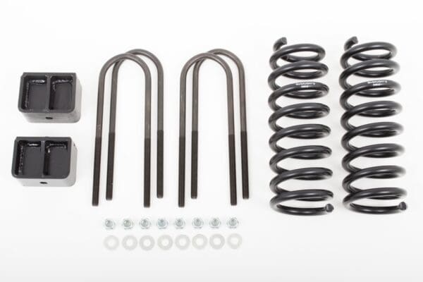 Truck suspension lift kit with hardware.