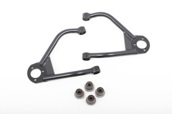 Black metal control arms and bushings.