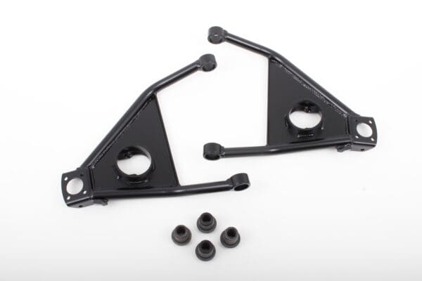 Black metal control arms with bushings.