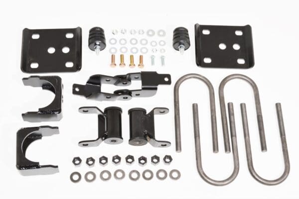 Suspension lift kit with hardware.