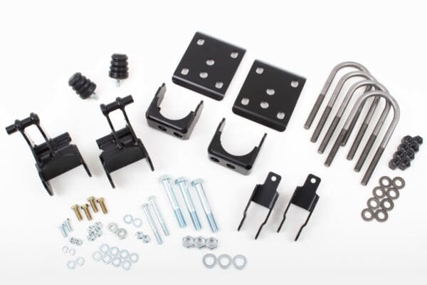 Suspension lift kit with hardware.