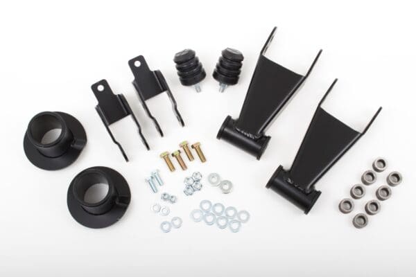 Truck lift kit with hardware and spacers.