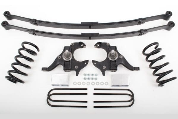 Car suspension kit with springs, shocks, and brackets.