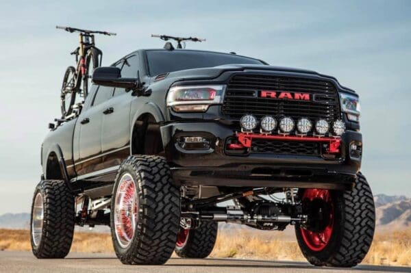 Black Ram truck with large tires.