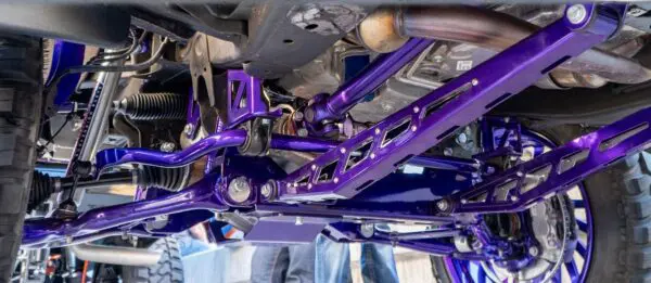 Purple suspension system on a car.