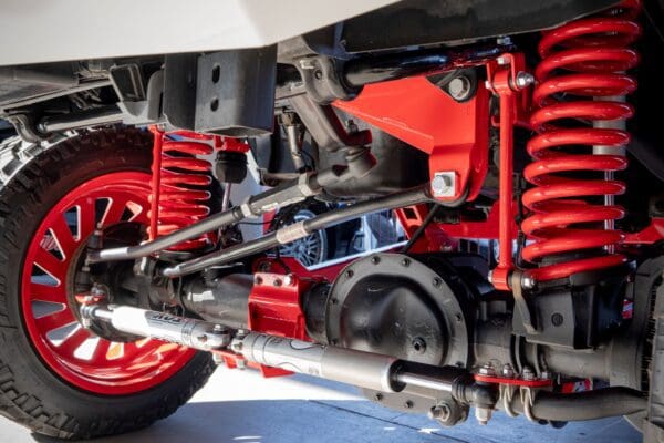 Red suspension system on a truck.