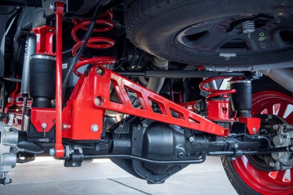 Red suspension system on a truck.