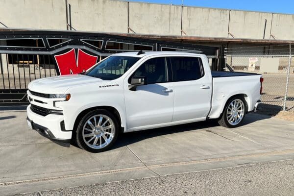 White Chevrolet Silverado pickup truck.