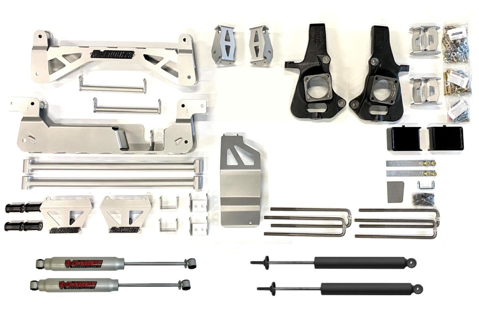 Suspension lift kit with hardware and shocks.