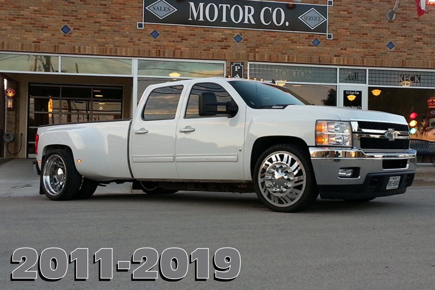 White Chevrolet Silverado dually truck.