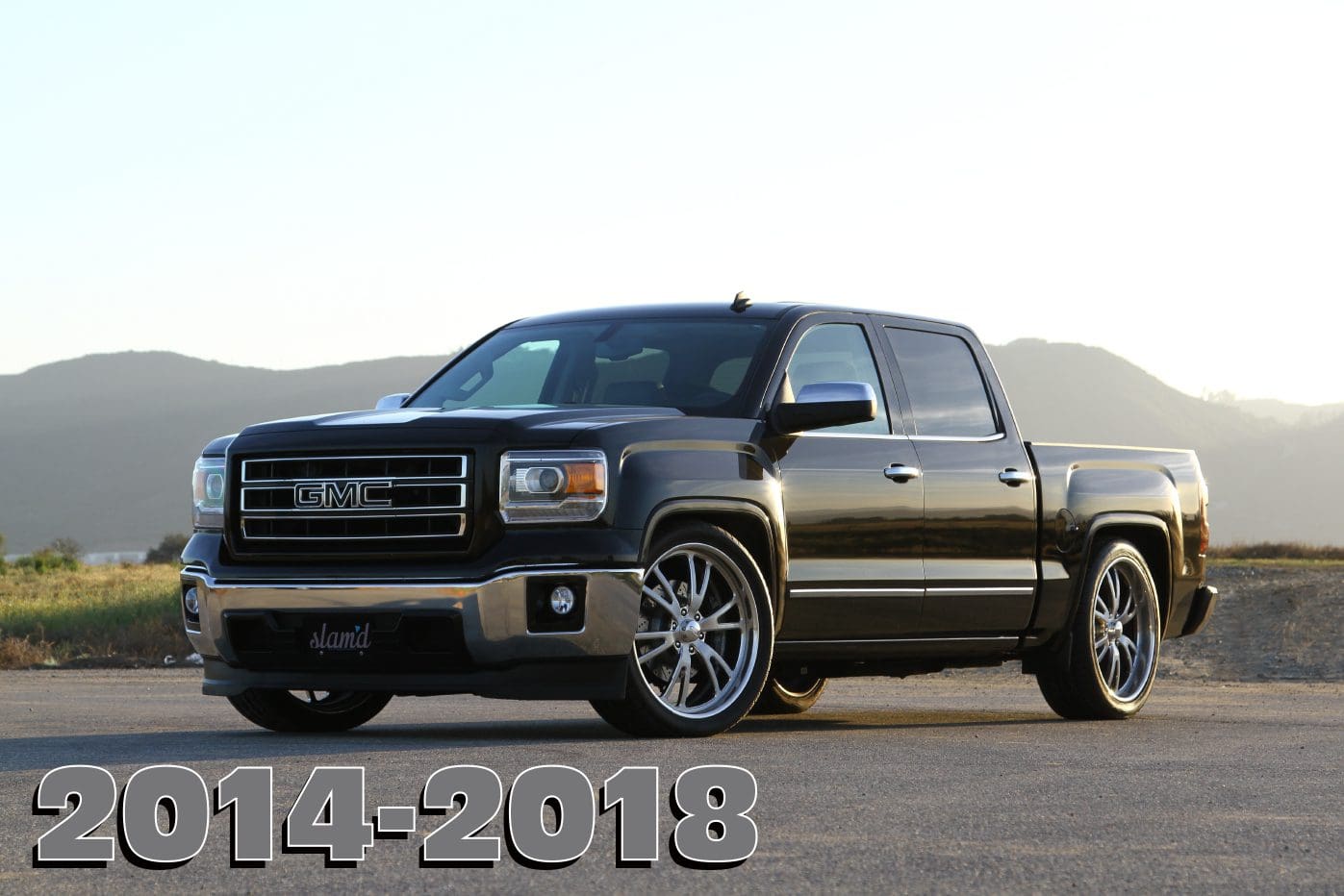 Black GMC Sierra 2014-2018 pickup truck.