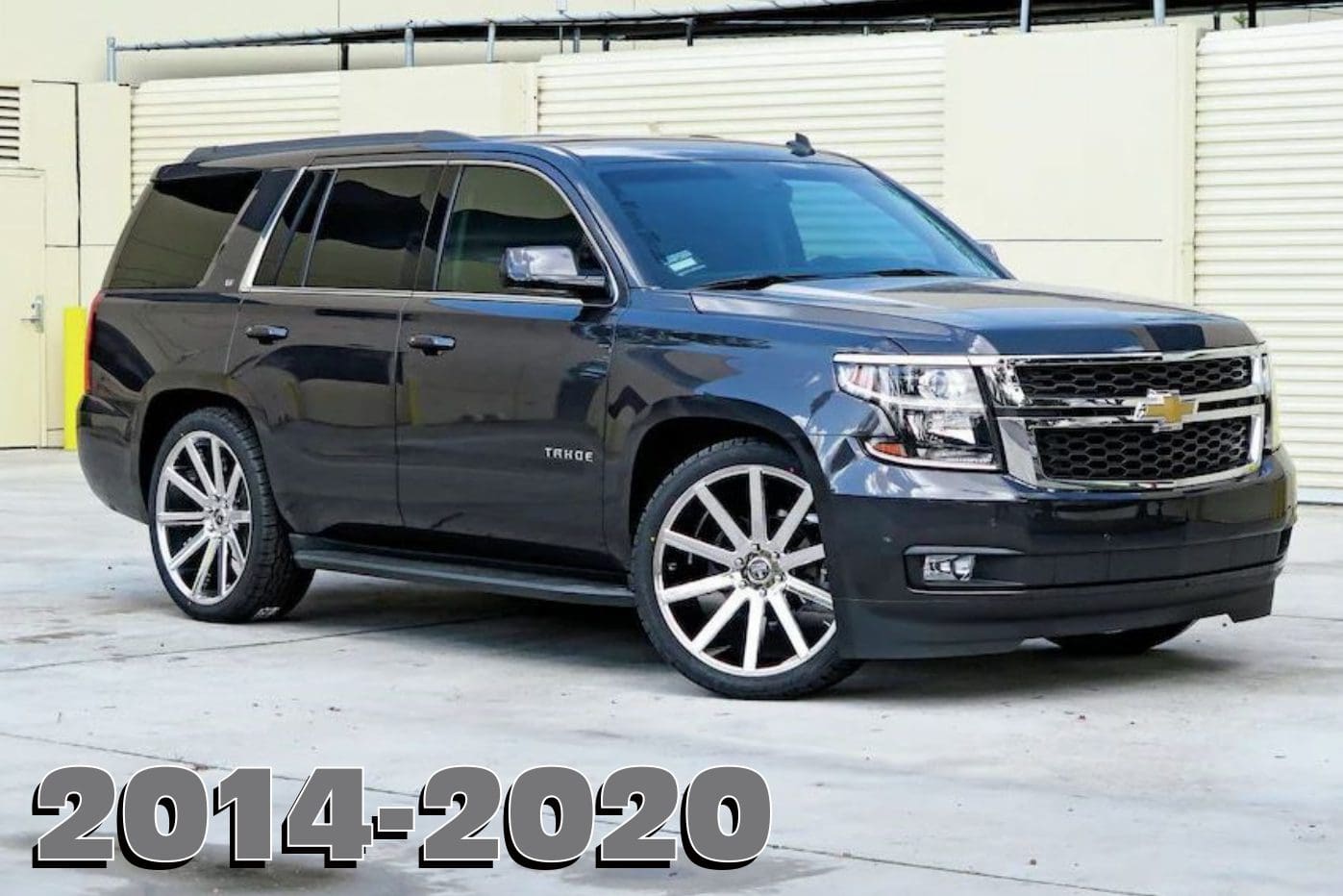 Black Chevrolet Tahoe with chrome wheels.