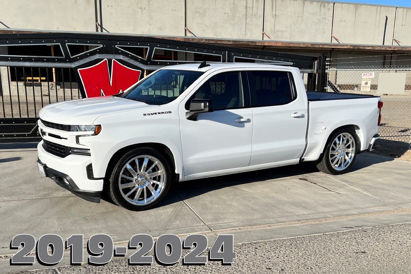 White Chevrolet Silverado pickup truck.