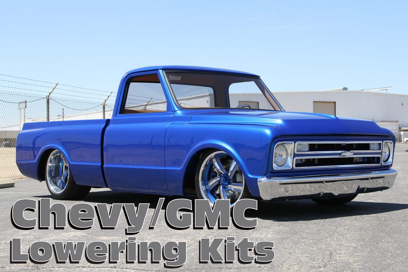 Blue Chevrolet pickup truck with lowering kit.