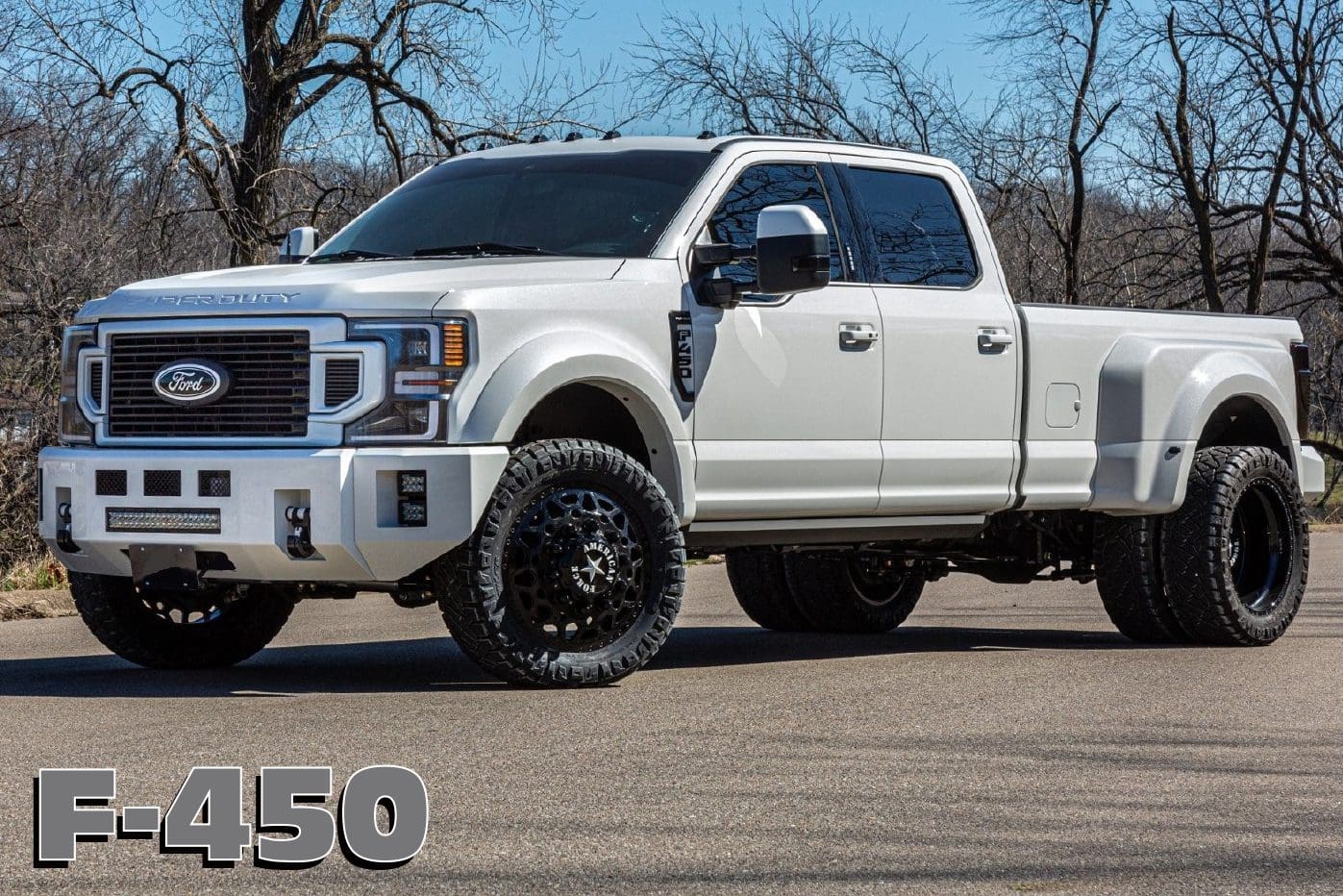 White Ford F-450 Super Duty truck.