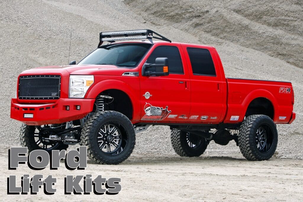 Red Ford F-Series pickup truck with lift kit.