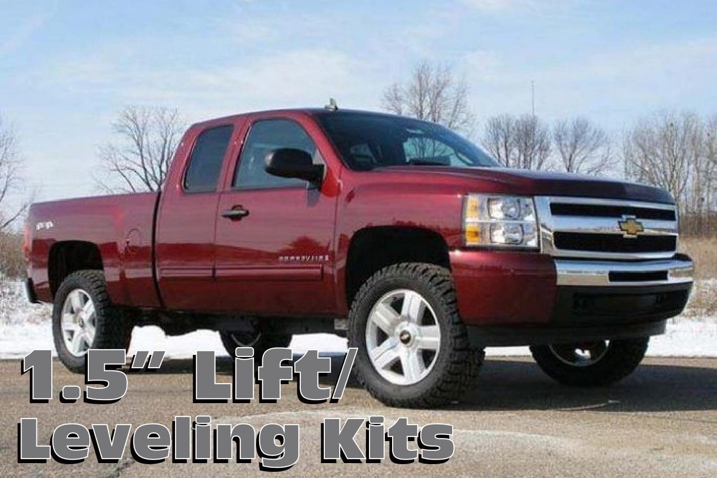 Red Chevrolet Silverado with lift kit.