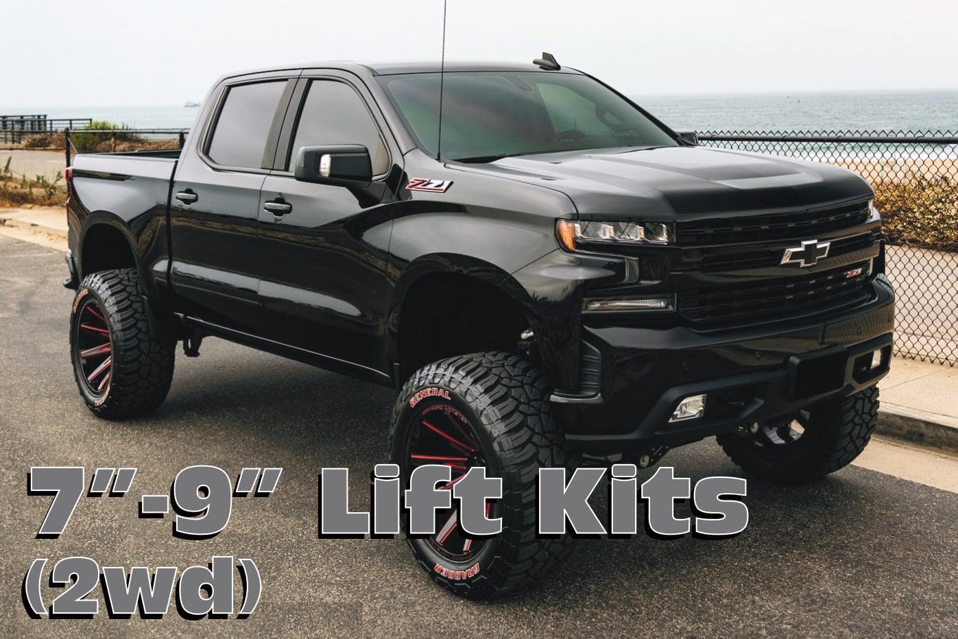 Black Chevrolet Silverado with lift kit.