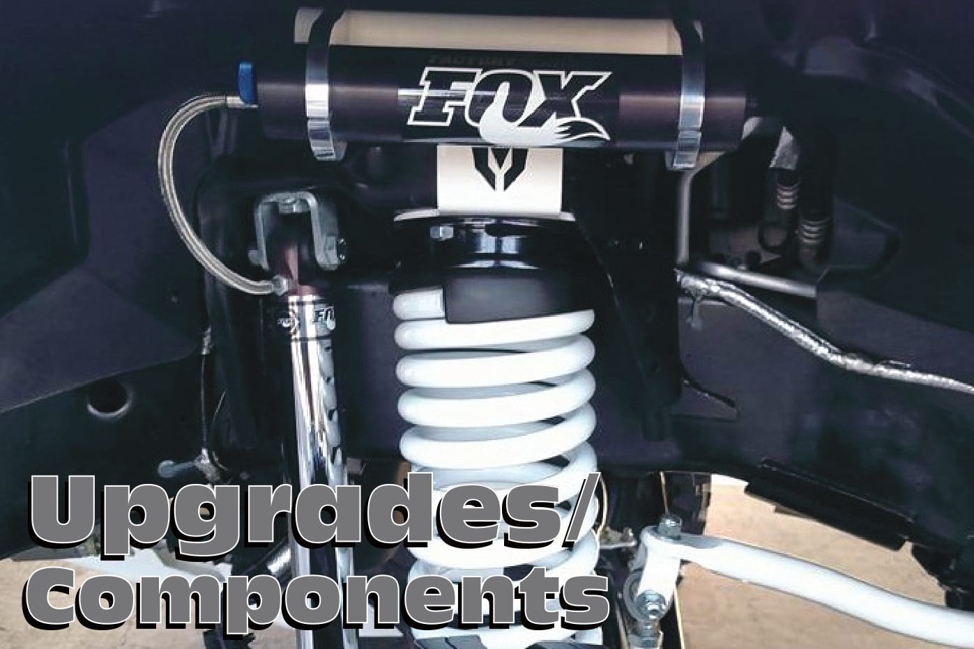 A close up of the front suspension on a motorcycle.