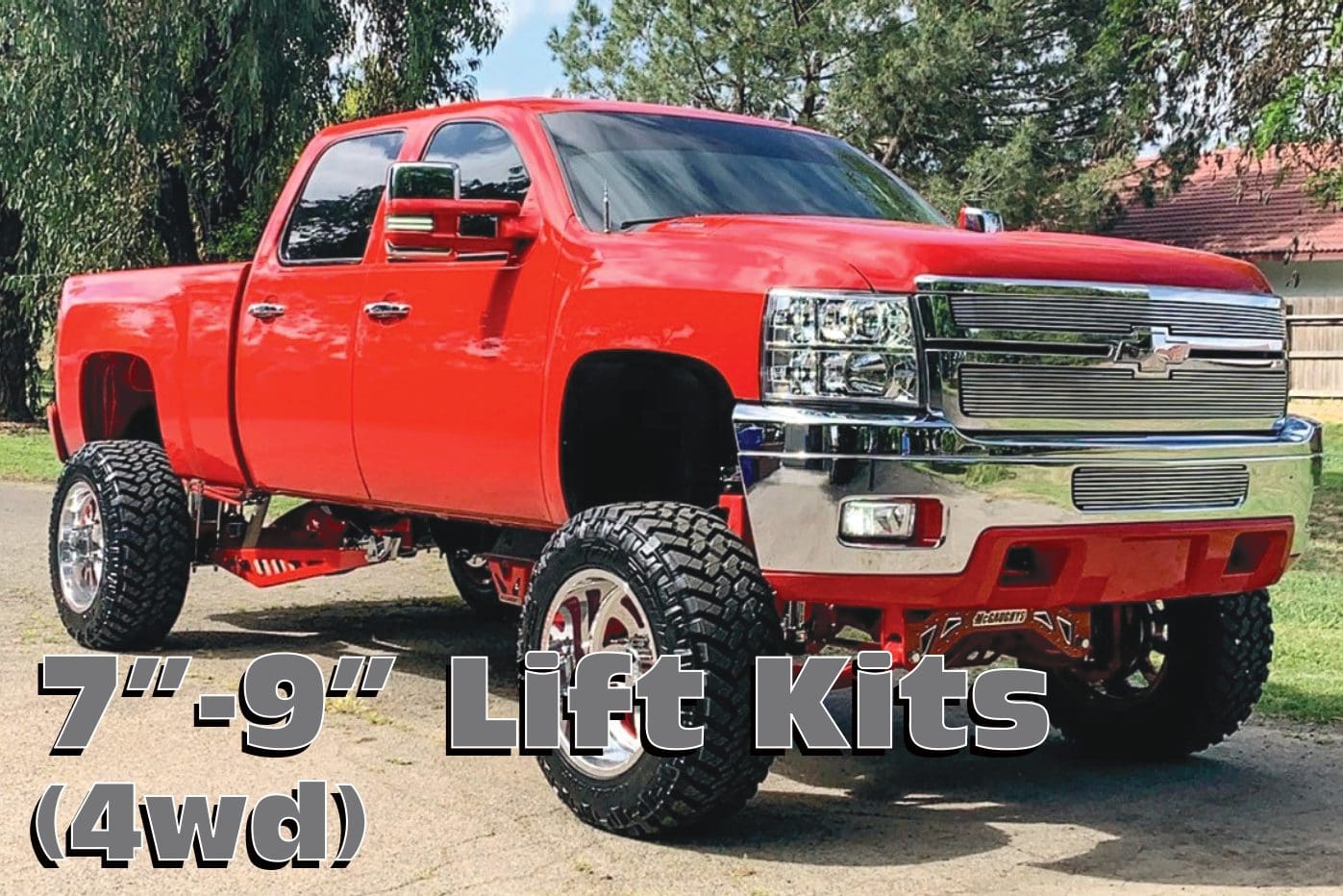 Red Chevrolet Silverado with lift kit.