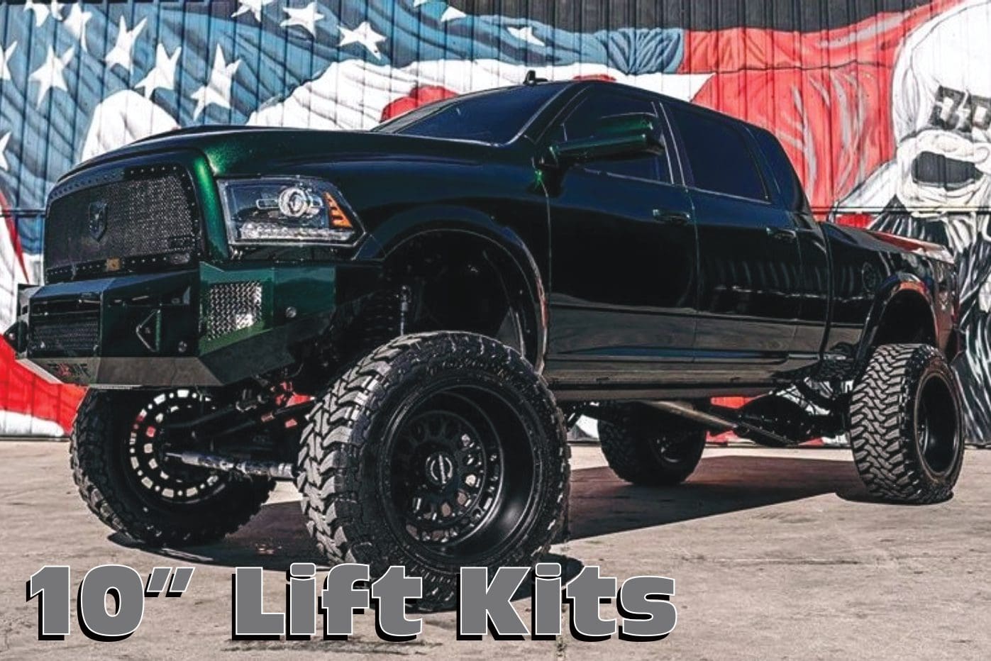 A black truck with large tires and big wheels.