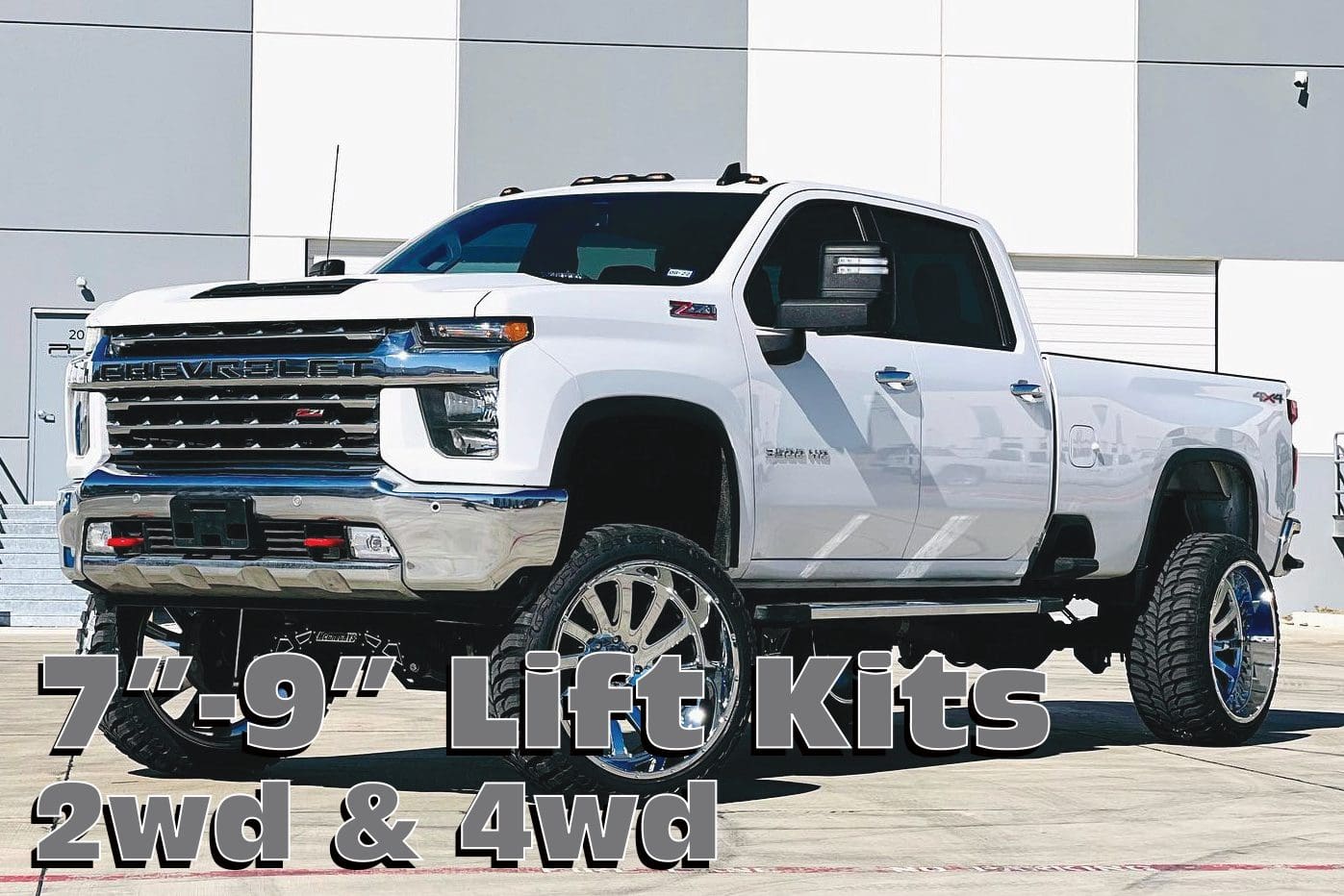 White Chevrolet Silverado with lift kit.