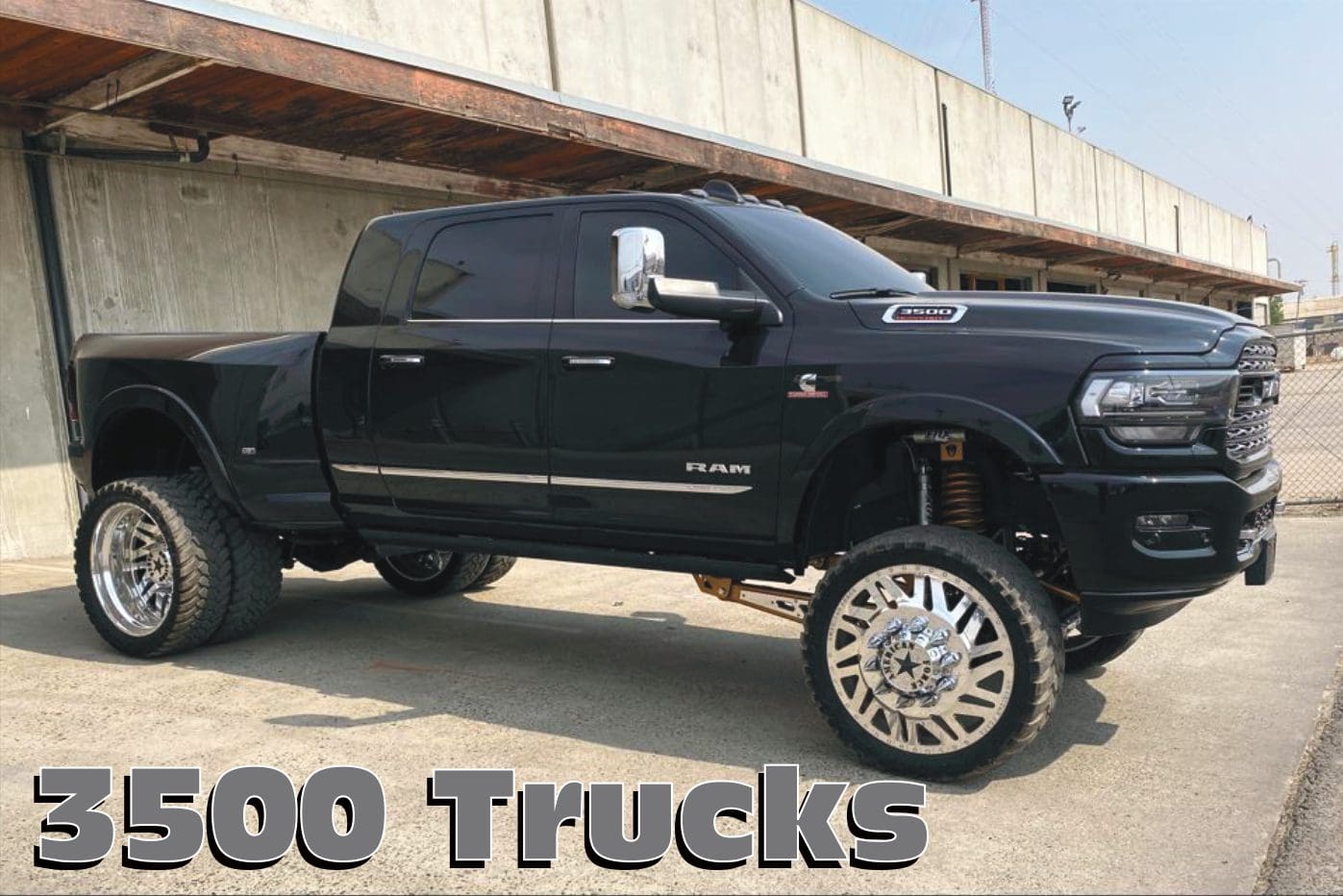 Black Ram 3500 pickup truck with chrome wheels.