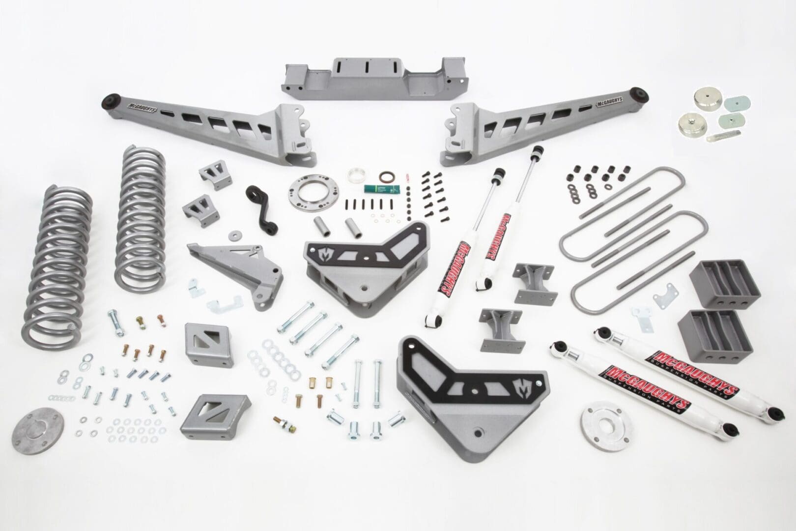 A white table with many different parts of the truck