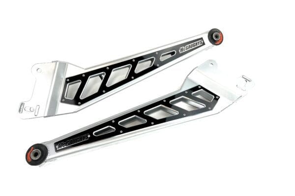 A pair of silver and black motorcycle side stands.