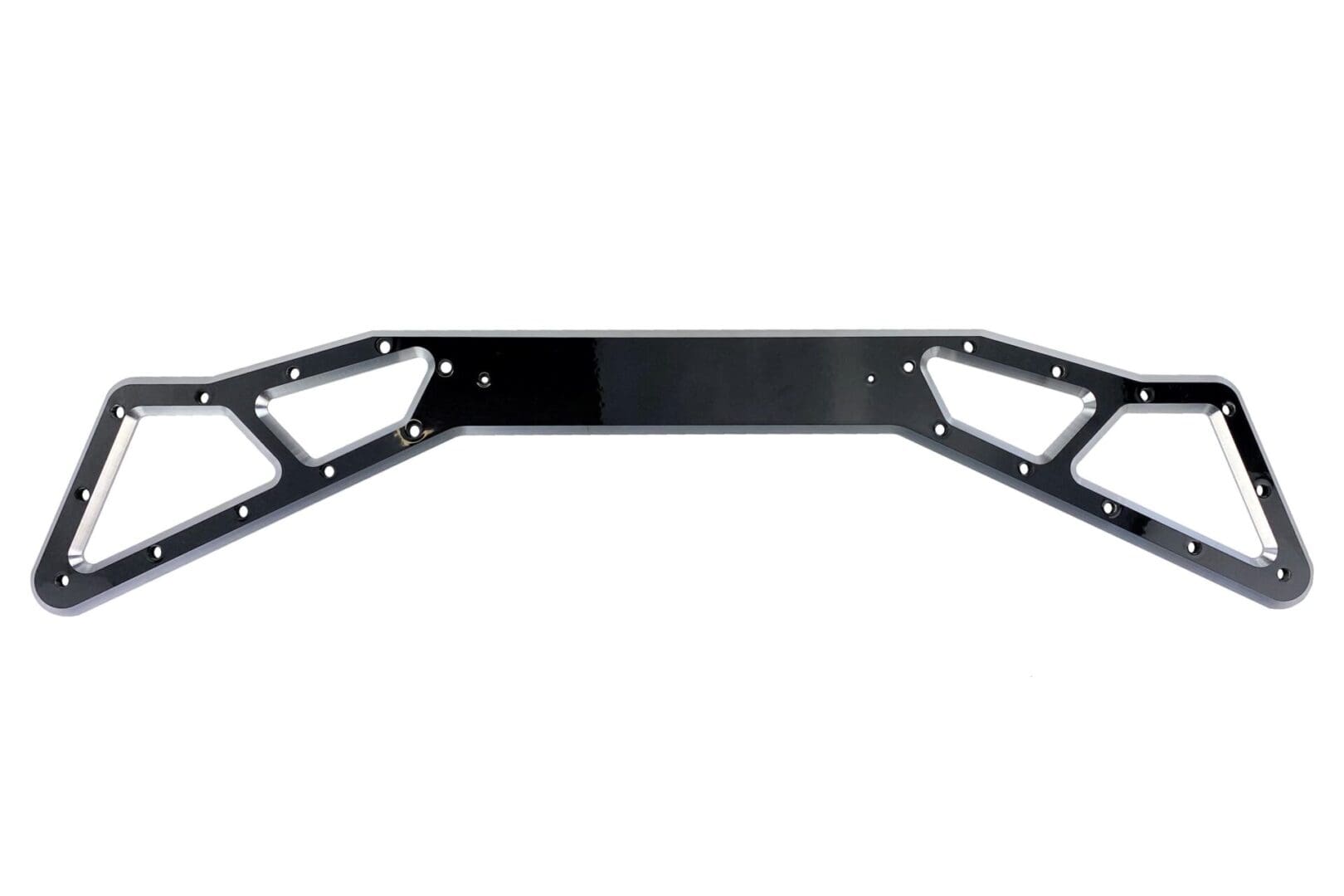 A black metal frame with two large holes.