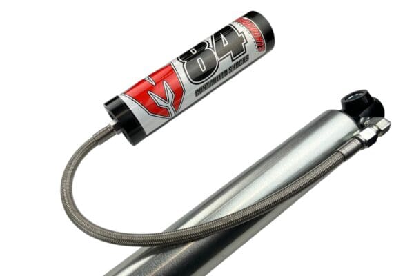 Here's an alt tag for the image: Controlled shocks reservoir and hose.